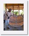 Wally showcases a solar powered cooker. The ring at top holds the pan you wish to heat.