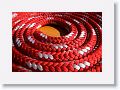 Hypnotic patterns of a coiled line