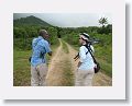 Our guide, Oliver Spencer of Periwinkle Tours, and Pat starting our rainforest hike above Wingfield Estate ruins