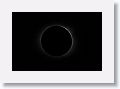 The last of an exposure bracket series at the end of Totality with Third Contact. This is the start of the Diamond Ring effect. Each exposure increased 2 EV in order to capture both the cornea glow close to the solar disk and the fainter rays further out into space.