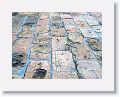 Well worn brick walkway